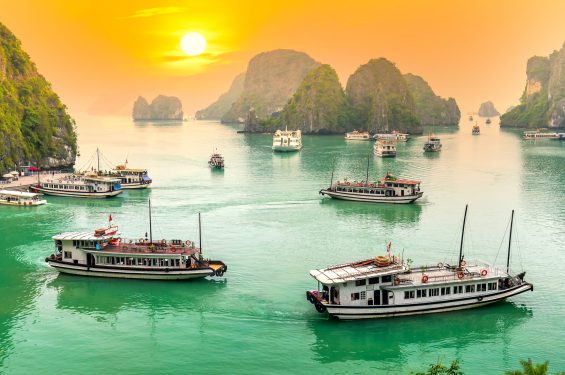Dreamy sunset landscape Halong Bay, Vietnam view from adove. This is the UNESCO World Heritage Site, a beautiful natural wonder in northern Vietnam